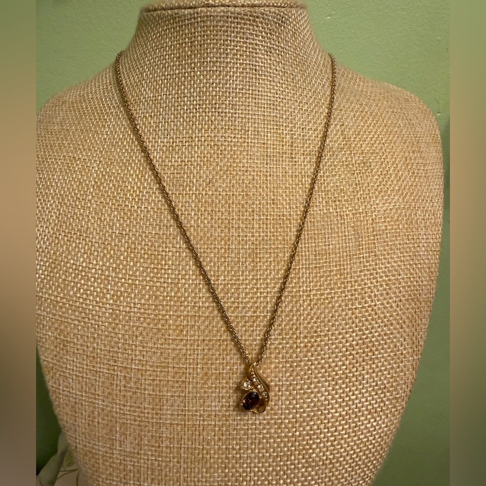 Elegant Gold Necklace with Purple and White Gemstones